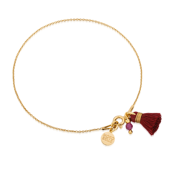 Bracelet with ruby stone and tassel
